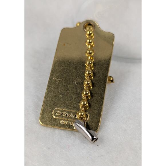 Coach metal bag tag goldtone Stagecoach 1 34" x 7/8"Ball chain included EUC - Picture 6 of 6